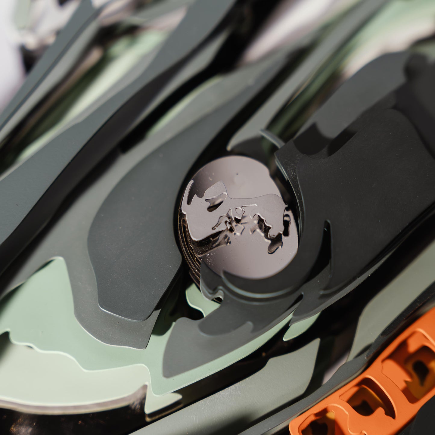 Close-up of a green car model with a blurred background
