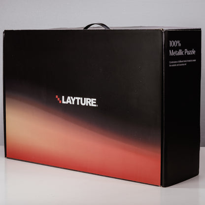 Black box with Layture branding on a gradient background