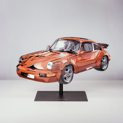 Model of an red sports car on a stand against a gray background